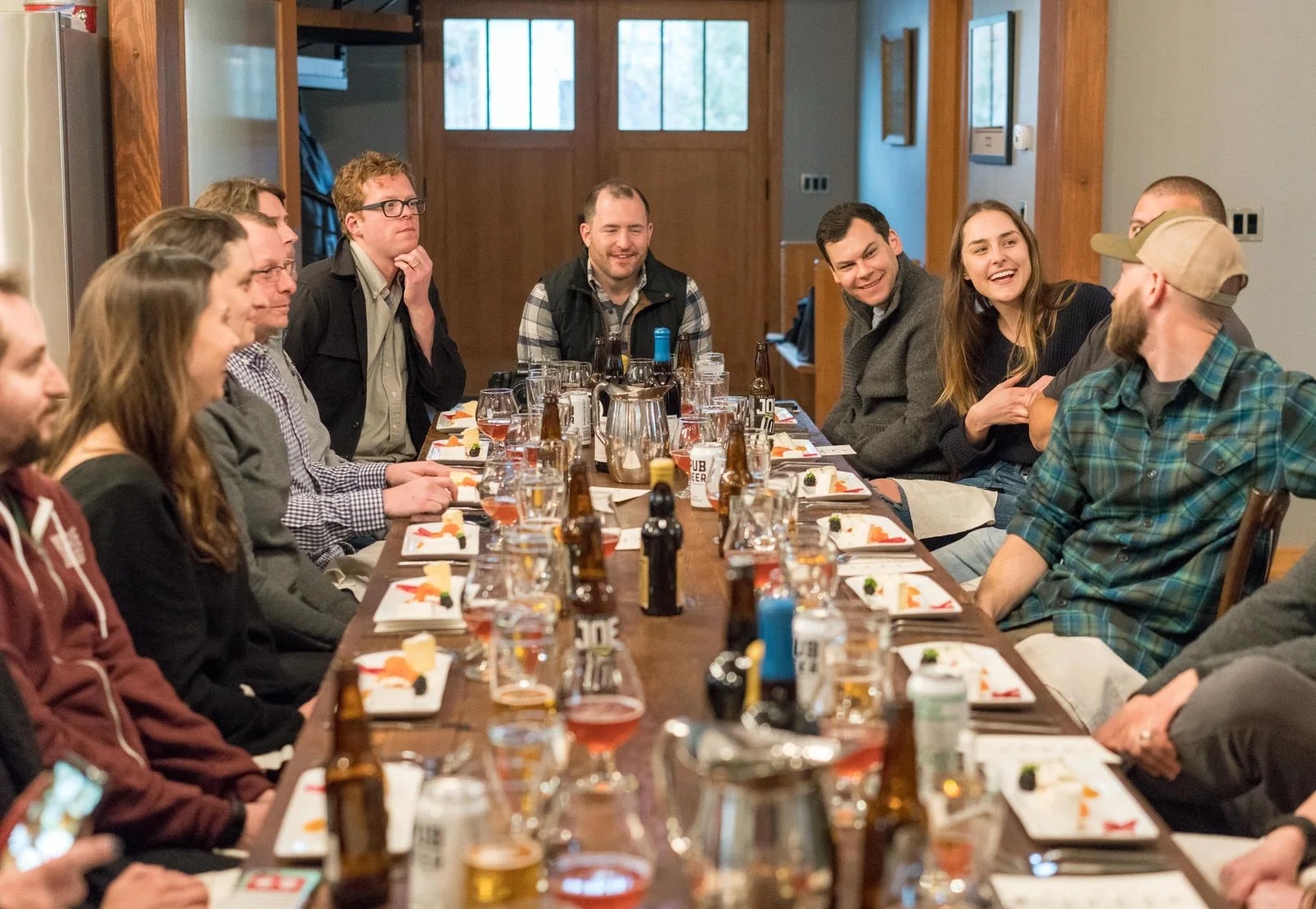 Guests sharing a meal and conversation at a restaurant