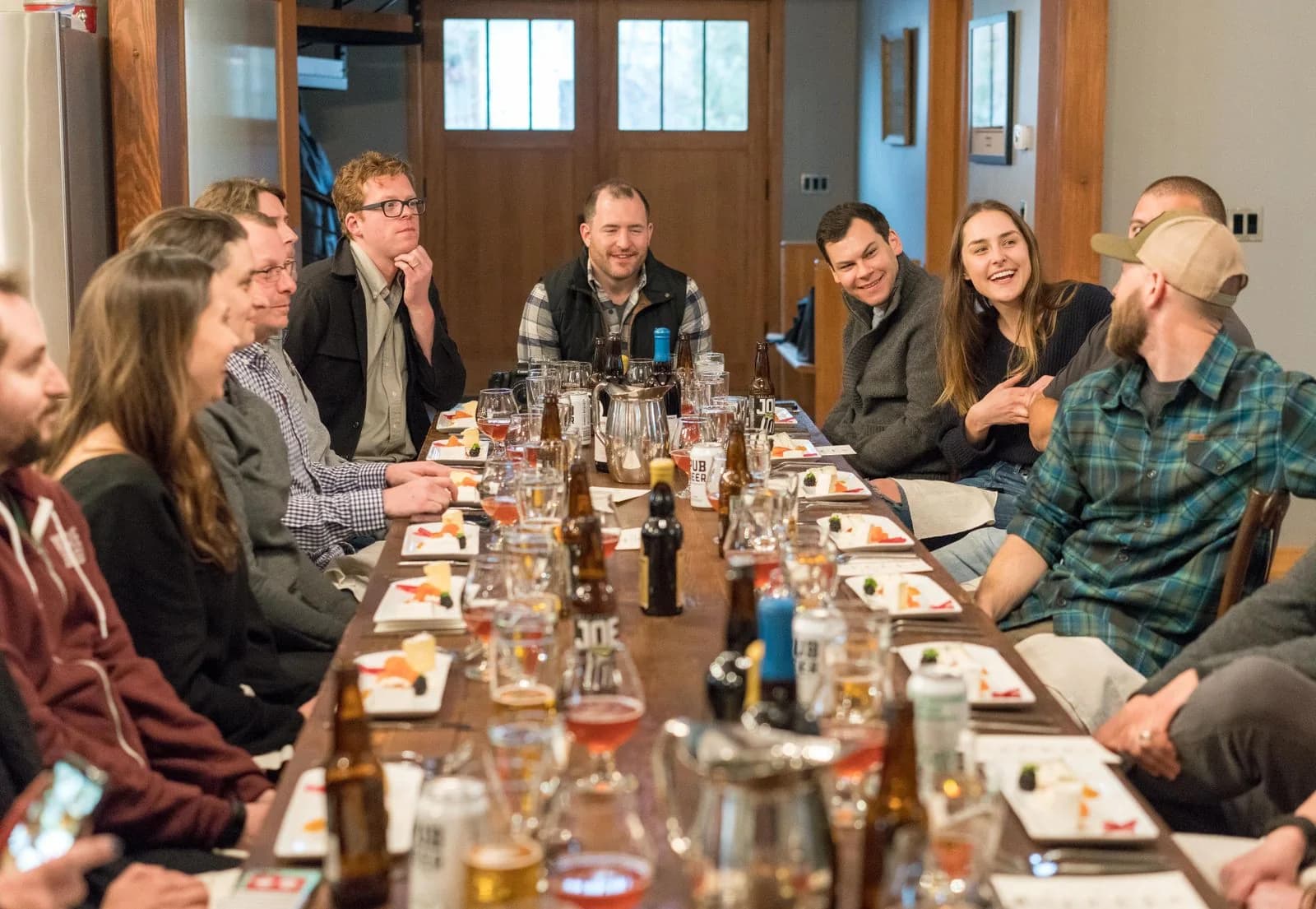 Guests sharing a meal and conversation at a restaurant