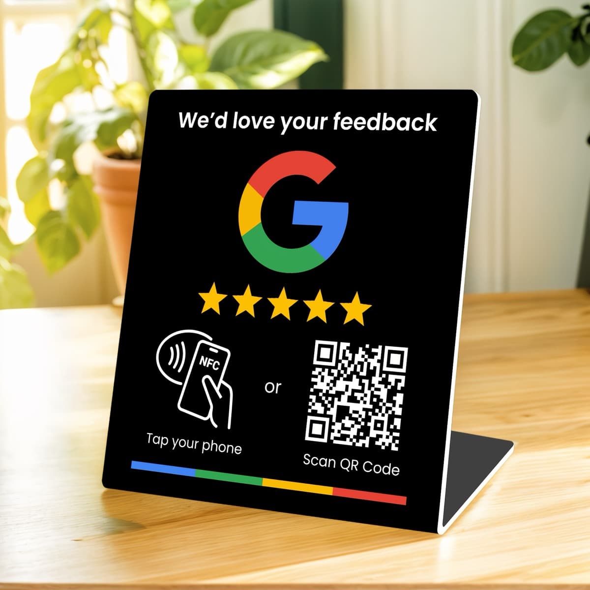 An NFC and QR review stand on a café counter, inviting customers to tap their phone or scan to leave a Google review